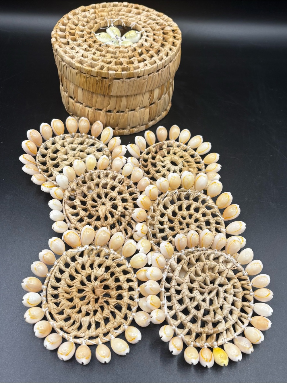 Vintage Coaster Set Hand Woven Straw Palm Basket and Six Cowrie Shell Coasters